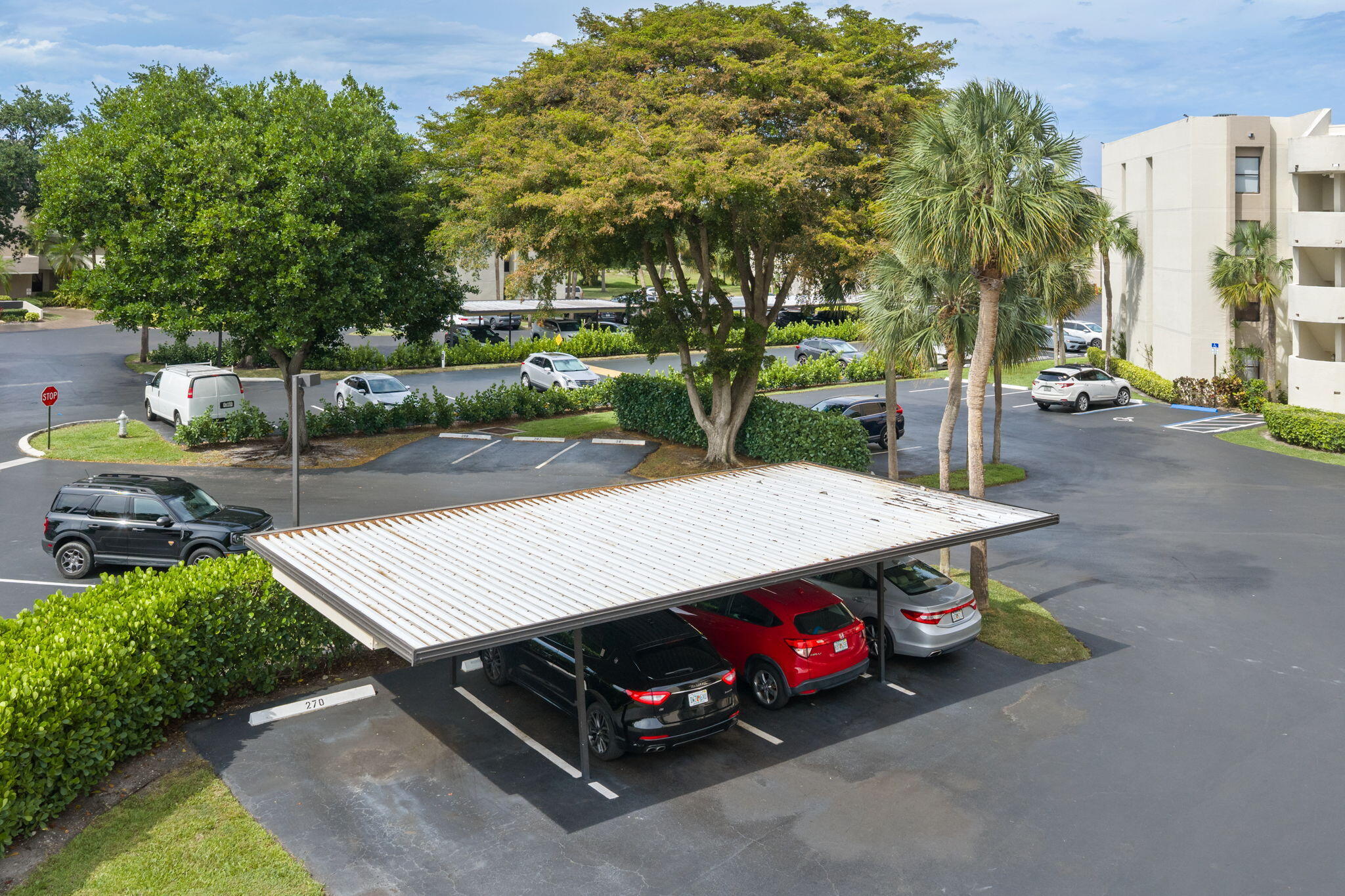 5701 Camino Del Sol, Unit 104 Boca Raton, FL 33433 - Photo 24 of 34 carport