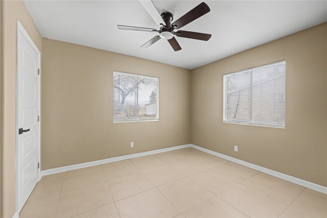 302 Palm Tree Drive Mathis, TX 78368 - Photo 20 of 28 a view of an empty room with a window