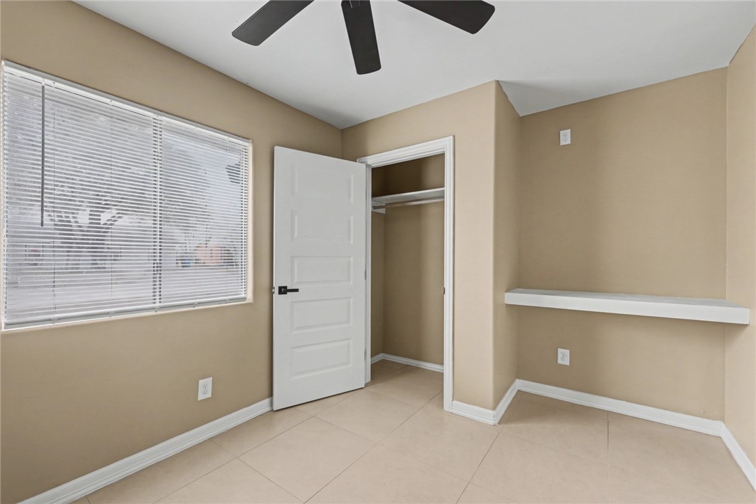 302 Palm Tree Drive Mathis, TX 78368 - Photo 22 of 28 a view of an empty room with a window