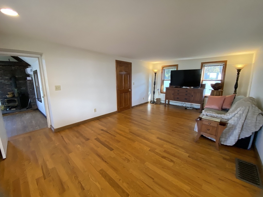 1 Warren Avenue Salisbury, MA 01952 - Photo 14 of 29 a view of livingroom with furniture and wooden floor