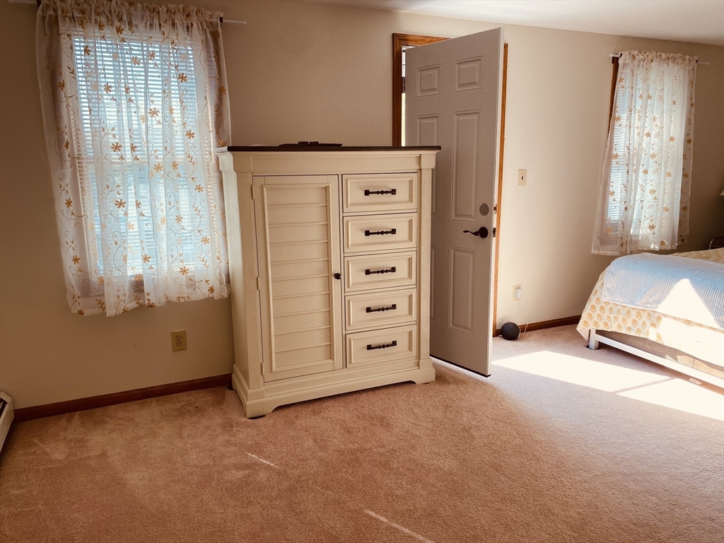 1 Warren Avenue Salisbury, MA 01952 - Photo 20 of 29 an empty room with windows and closet