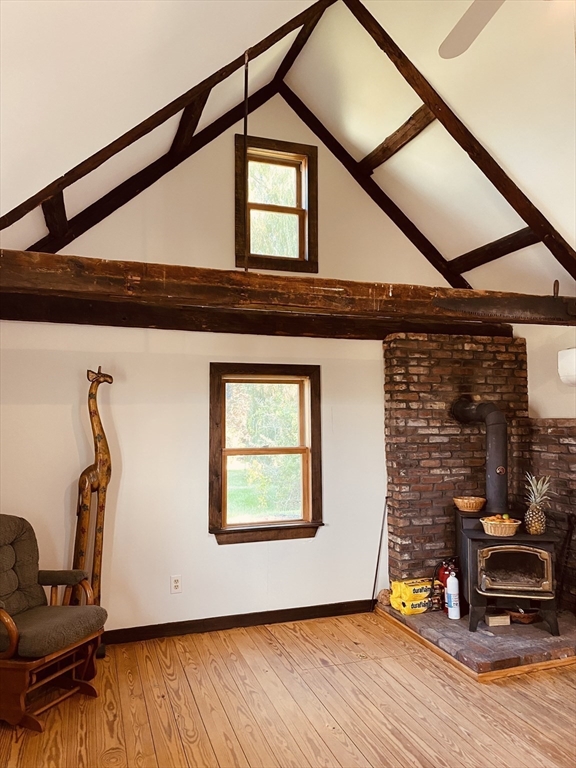1 Warren Avenue Salisbury, MA 01952 - Photo 7 of 29 a backyard of a house with wooden floor and a table and chairs