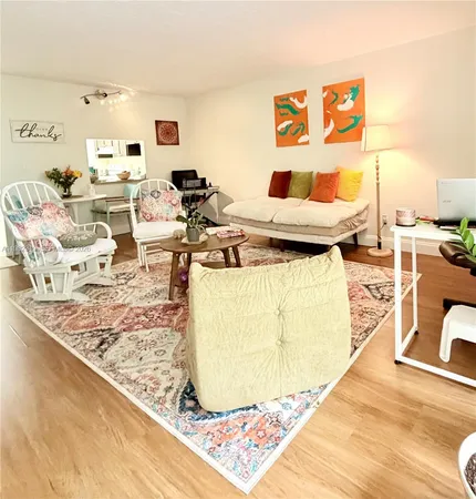 a living room with furniture and a table