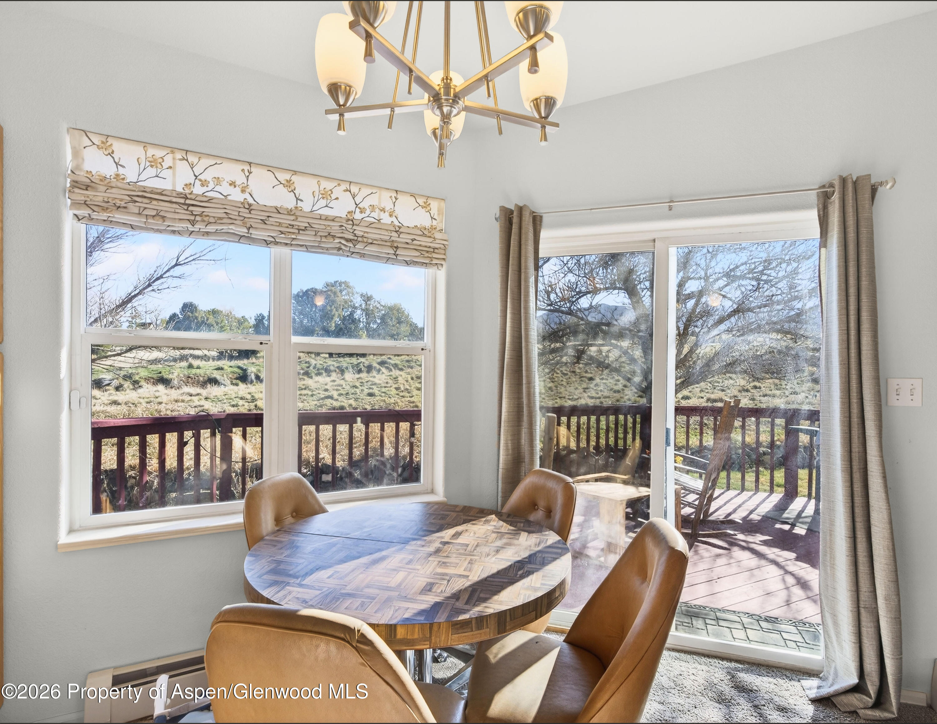 51 North Ridge Court Parachute, CO 81635 - Photo 11 of 28 a living room with furniture and a window