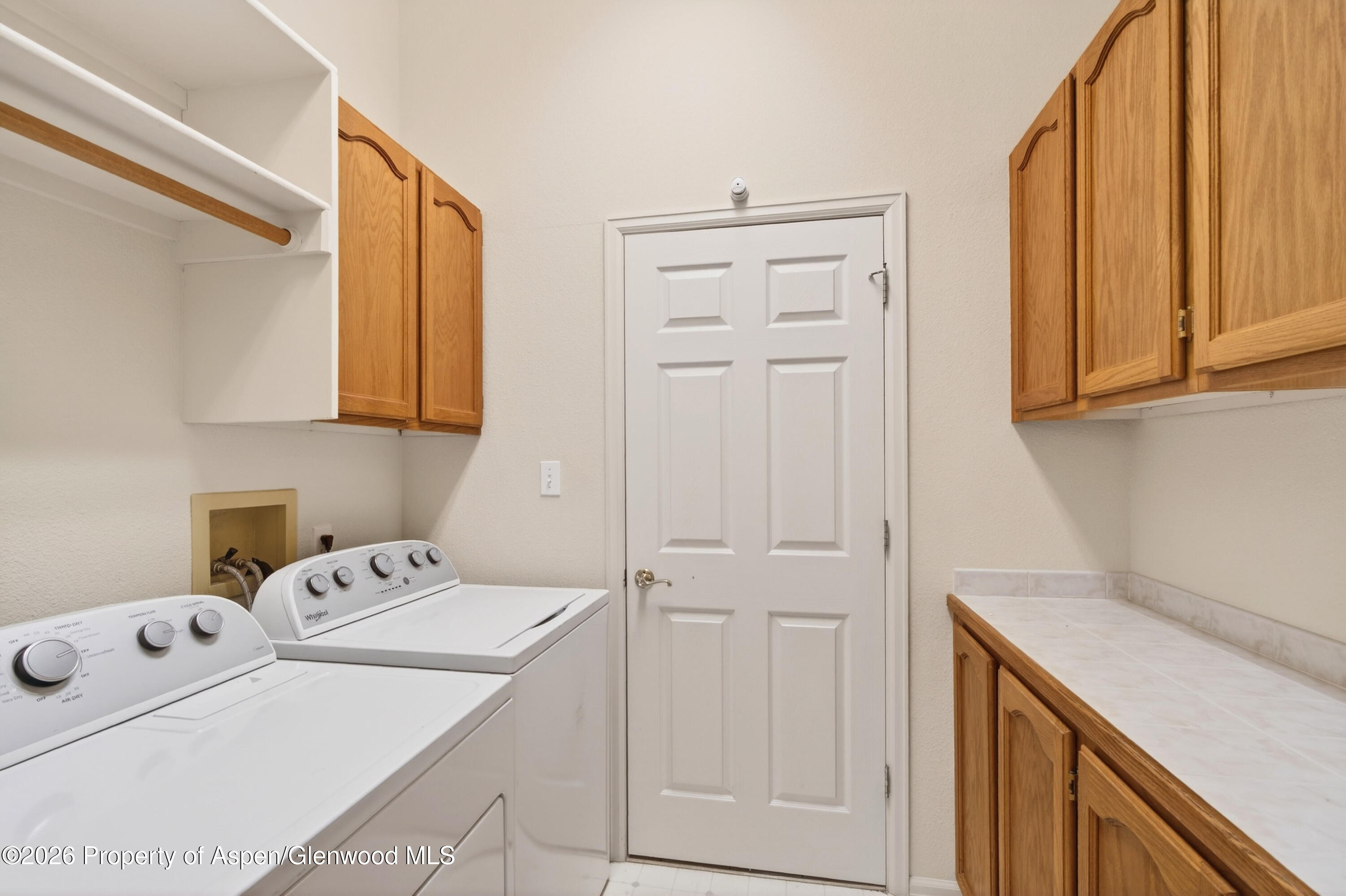 51 North Ridge Court Parachute, CO 81635 - Photo 20 of 28 a utility room with dryer and washer