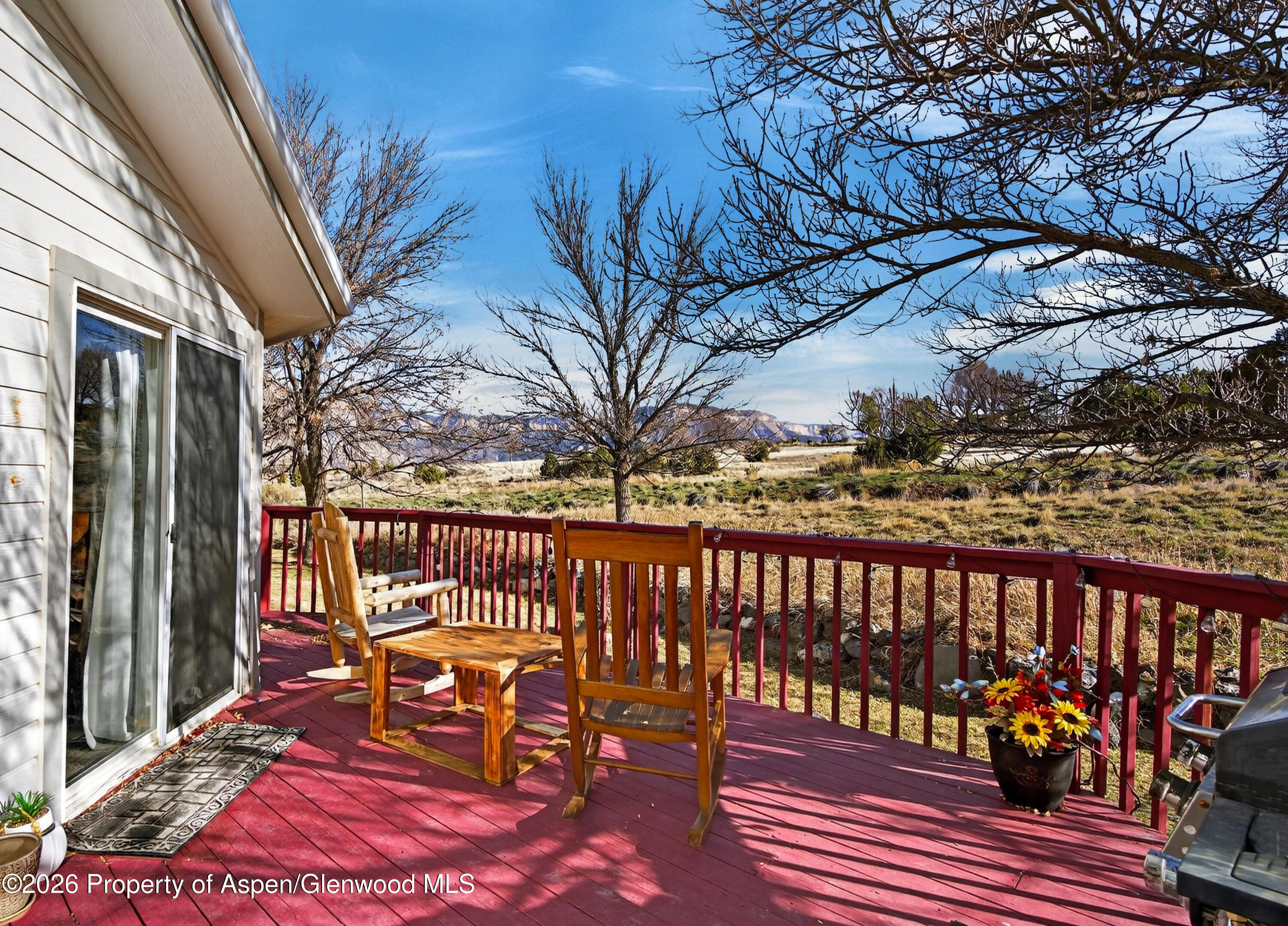 51 North Ridge Court Parachute, CO 81635 - Photo 22 of 28 a balcony with wooden benches