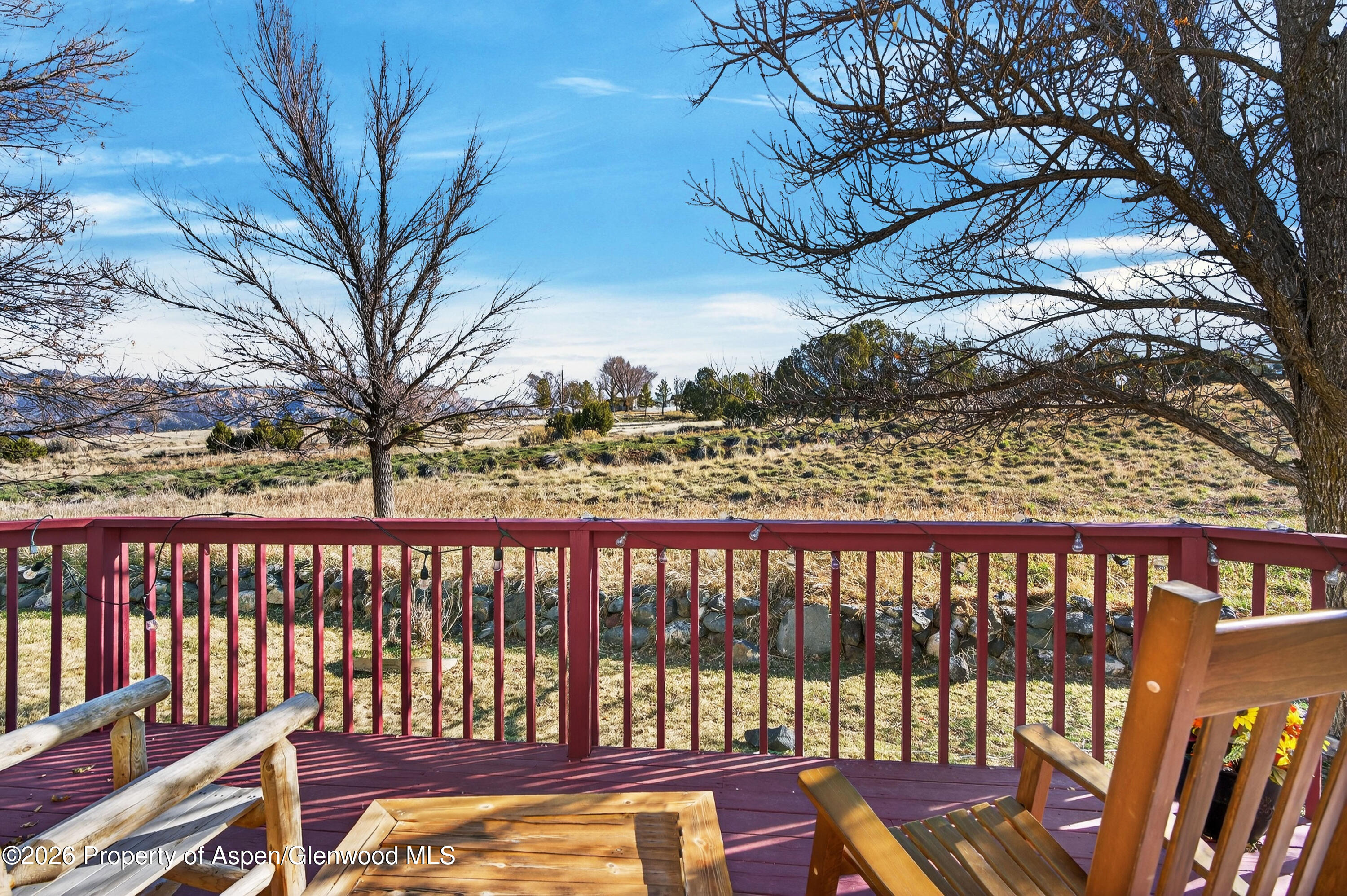51 North Ridge Court Parachute, CO 81635 - Photo 23 of 28 a view of a wooden roof deck