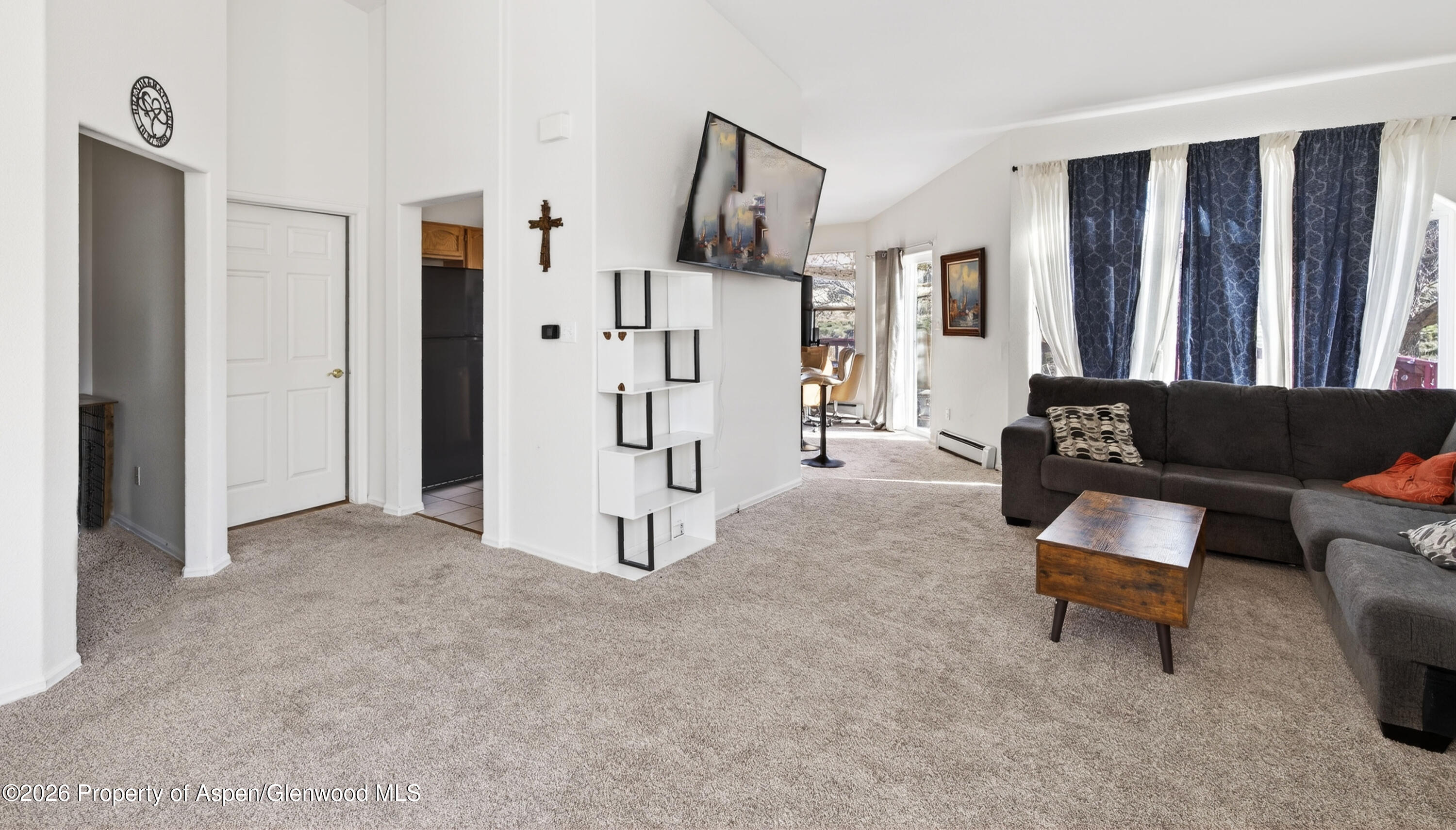 51 North Ridge Court Parachute, CO 81635 - Photo 6 of 28 a living room with furniture and white walls