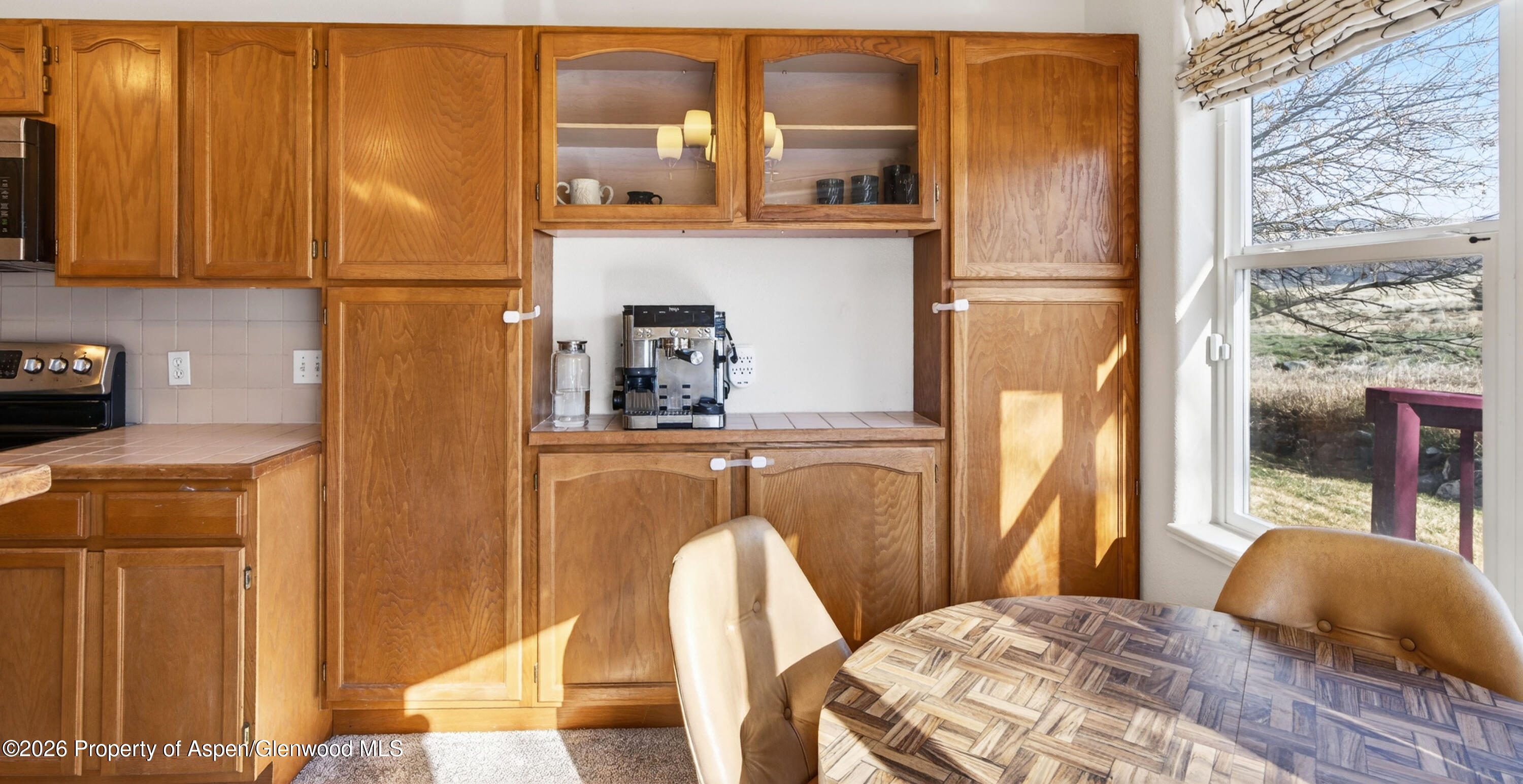 51 North Ridge Court Parachute, CO 81635 - Photo 10 of 28 a bedroom with a bed and wooden floor