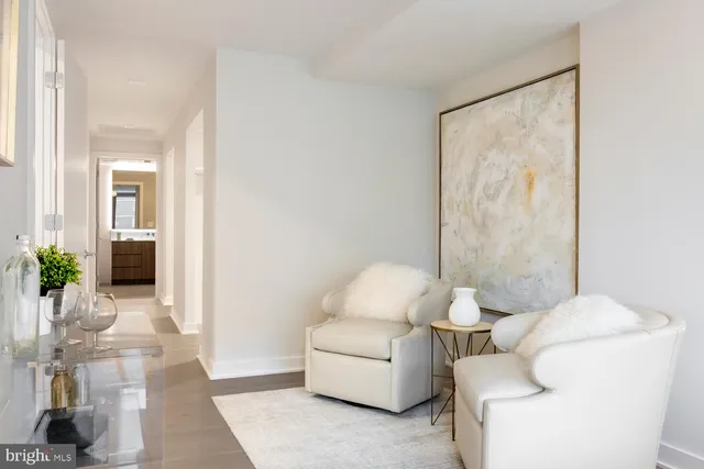 a bathroom with a double vanity sink and mirror