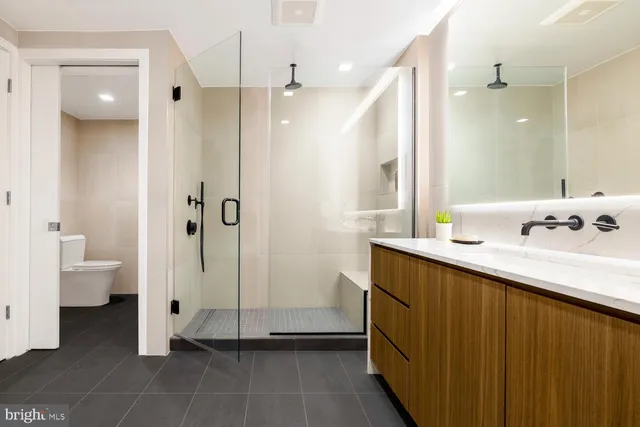 a white tub sitting in a bathroom