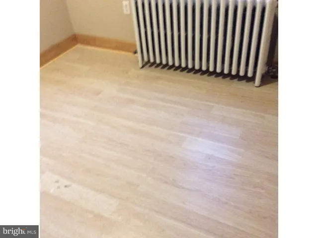 a view of a hallway with stairs