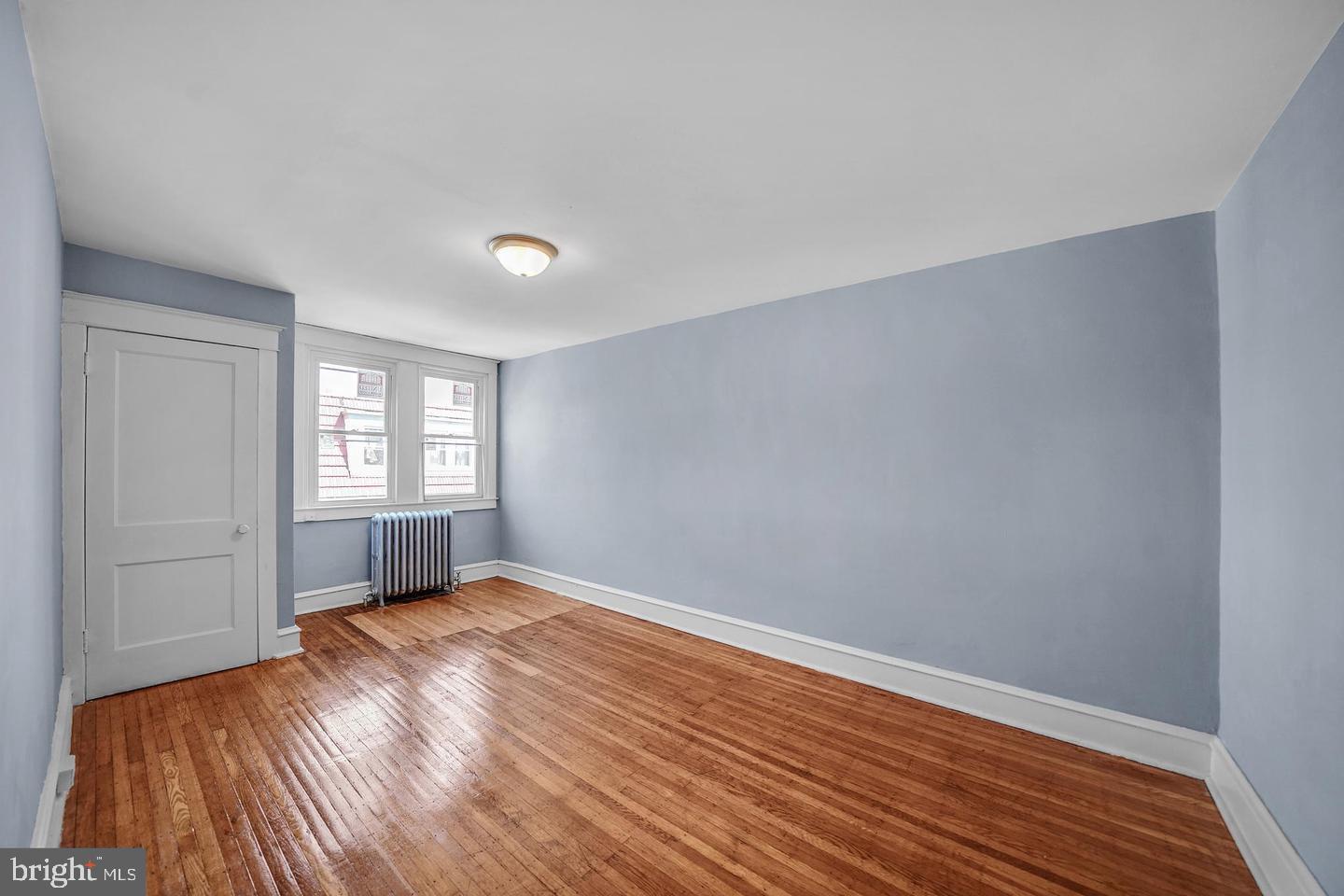 719 North Shedwick Street Philadelphia, PA 19104 - Photo 22 of 24 a view of empty room with wooden floor and fan