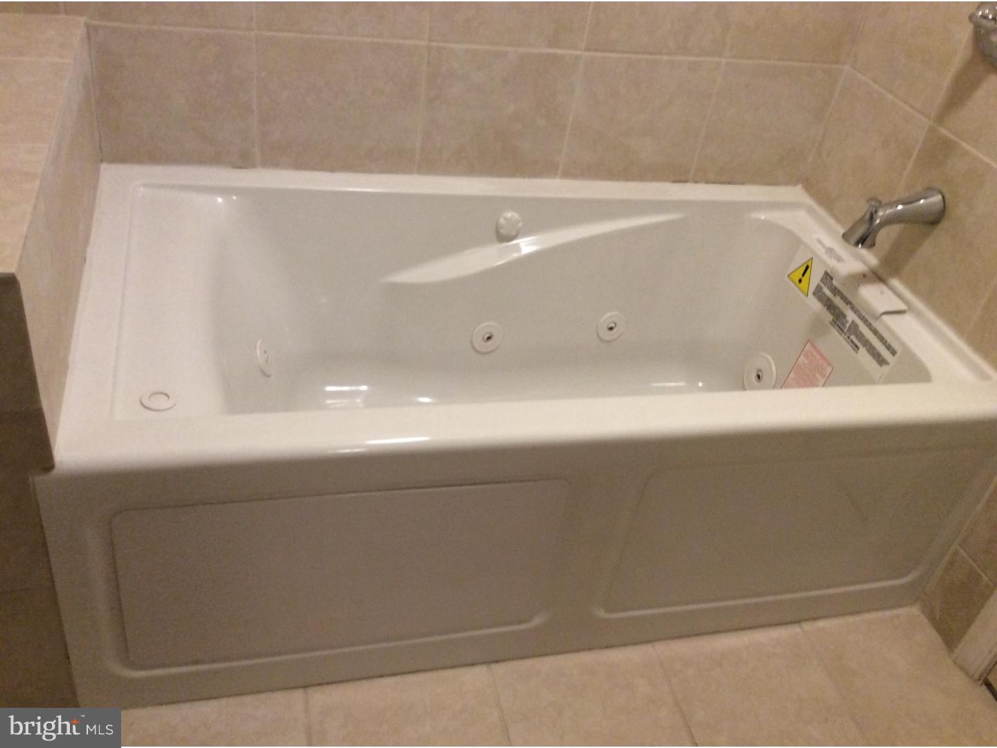 719 North Shedwick Street Philadelphia, PA 19104 - Photo 6 of 24 a bathroom with a bathtub