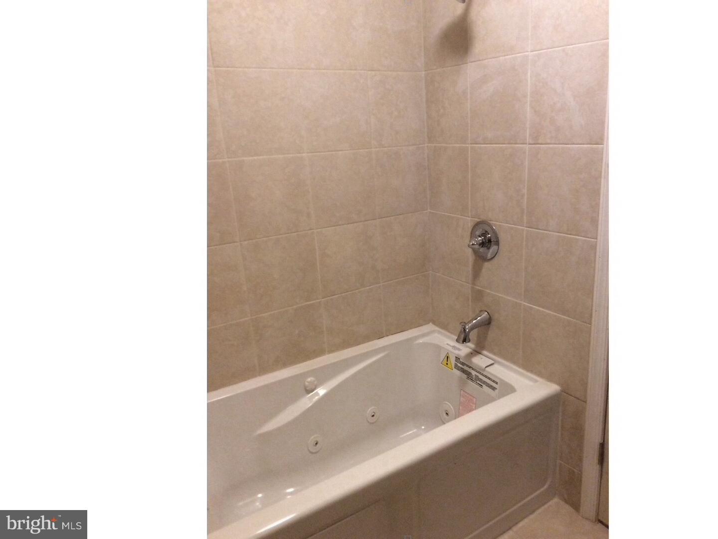 719 North Shedwick Street Philadelphia, PA 19104 - Photo 8 of 24 a bathroom with a bathtub