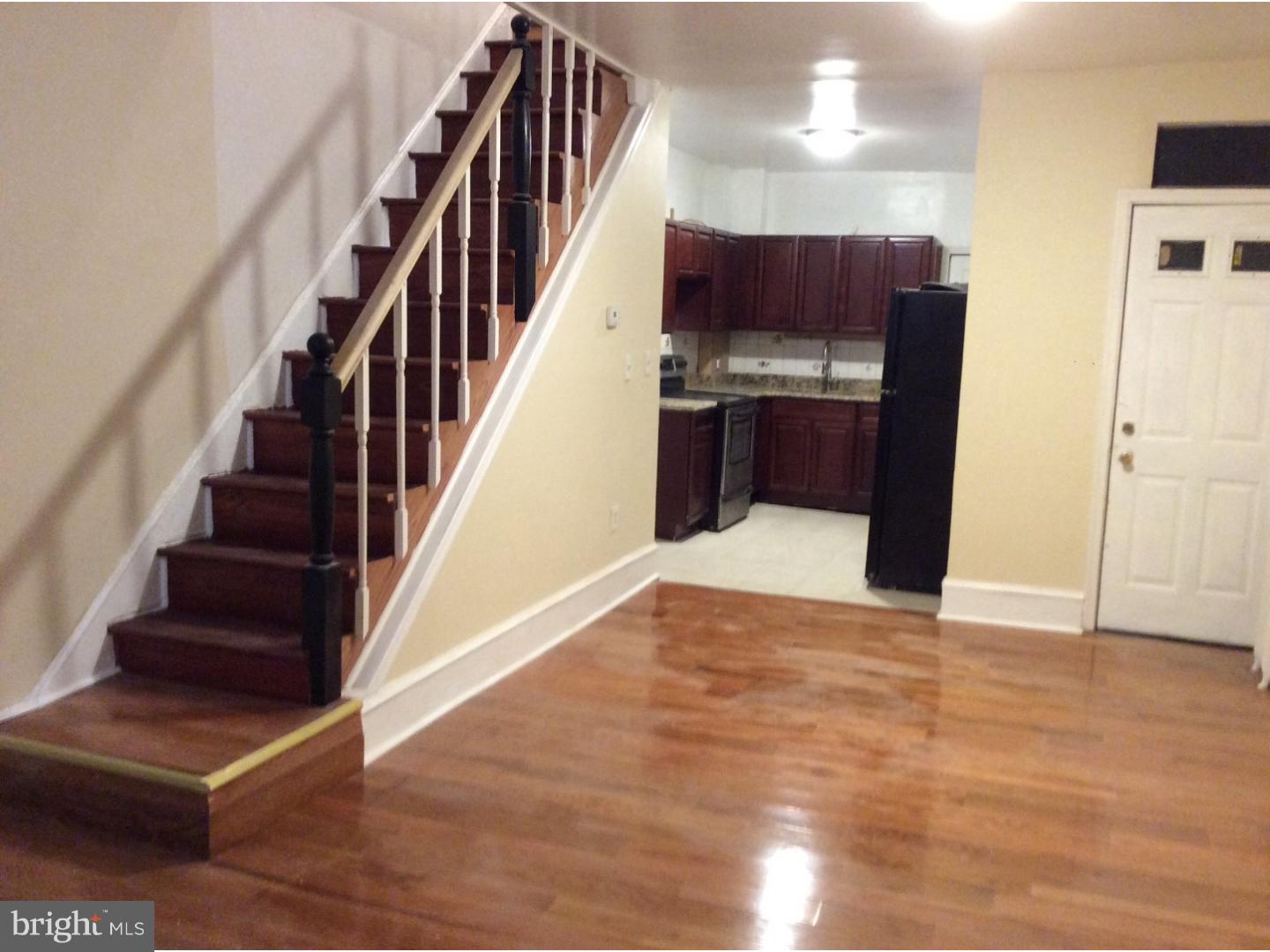 719 North Shedwick Street Philadelphia, PA 19104 - Photo 9 of 24 a view of entryway and hall with wooden floor