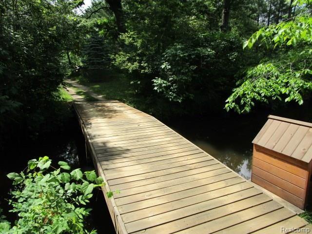 10382 Horton Road Goodrich, MI 48438 - Photo 19 of 72 Bridge over Thread creek will accommodate a golf cart or an ATV