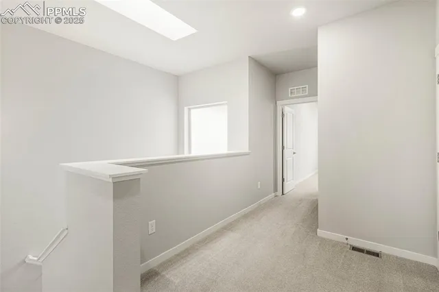 a view of a balcony with an outdoor space