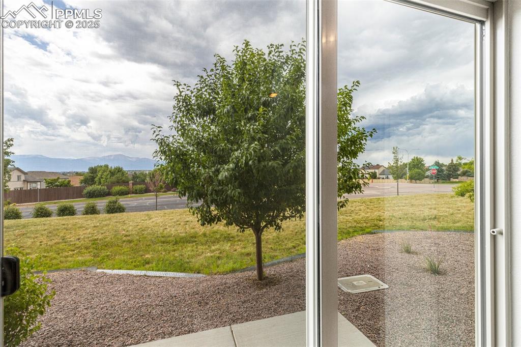 5466 Arden Grove Colorado Springs, CO 80922 - Photo 33 of 35 a view of a balcony with an outdoor space