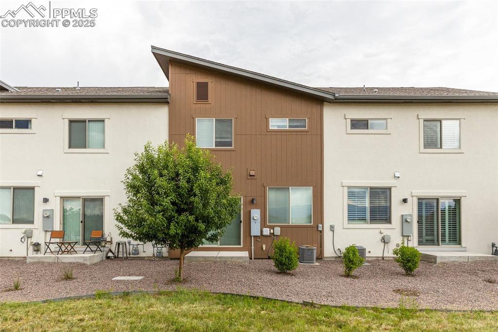 5466 Arden Grove Colorado Springs, CO 80922 - Photo 34 of 35 a front view of a house with garden