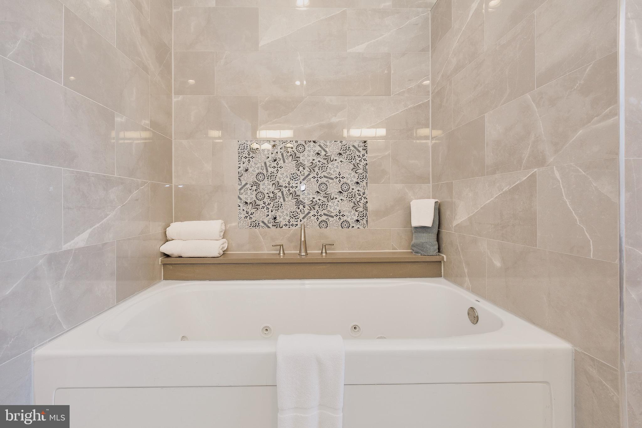 7817 Fairgreen Road Dundalk, MD 21222 - Photo 43 of 57 WHIRLPOOL TUB W/STUNNING TILE WORK