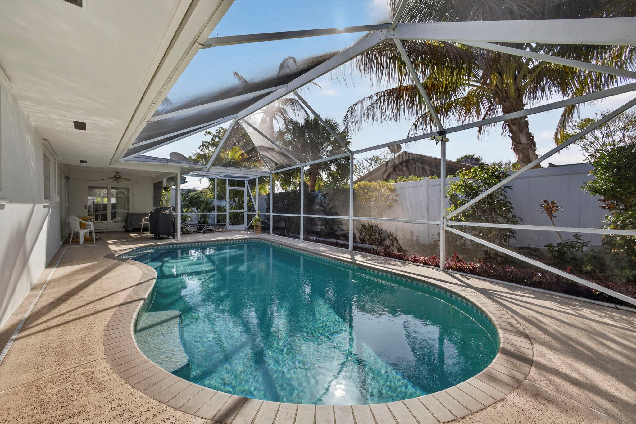 12753 Longford Road North Palm Beach, FL 33408 - Photo 37 of 68 a view of a house with swimming pool