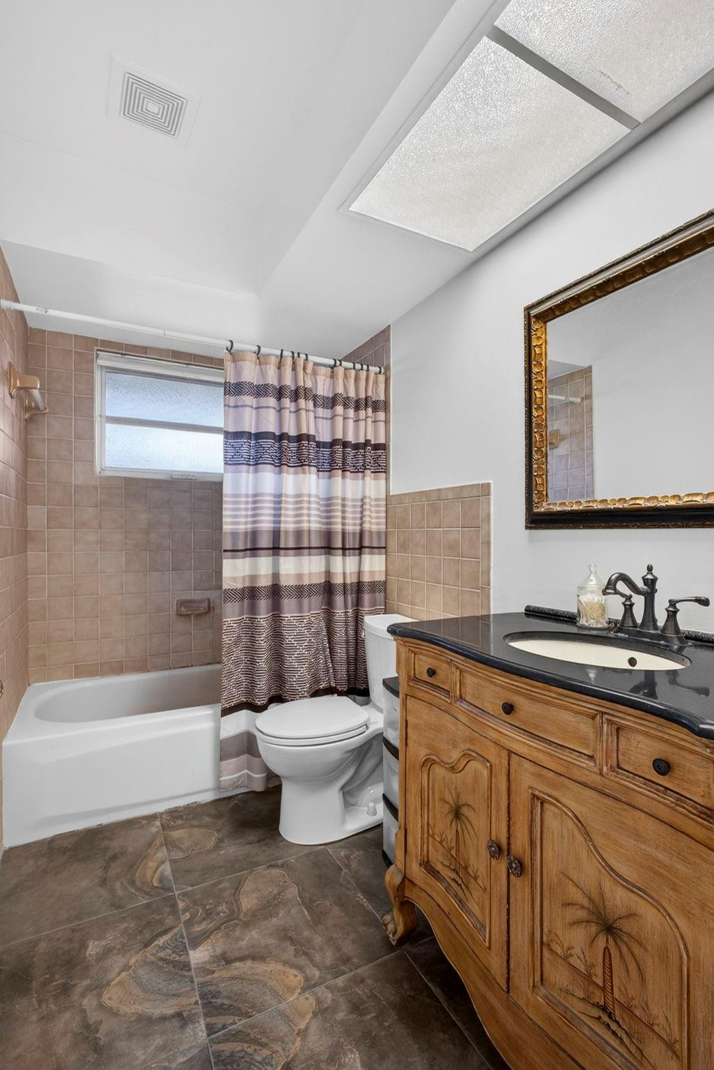 12753 Longford Road North Palm Beach, FL 33408 - Photo 44 of 68 a bathroom with a sink toilet and shower