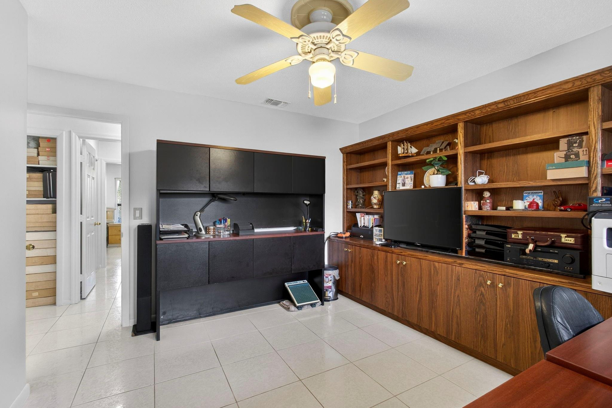 12753 Longford Road North Palm Beach, FL 33408 - Photo 45 of 68 a kitchen with stainless steel appliances a stove a refrigerator and a microwave