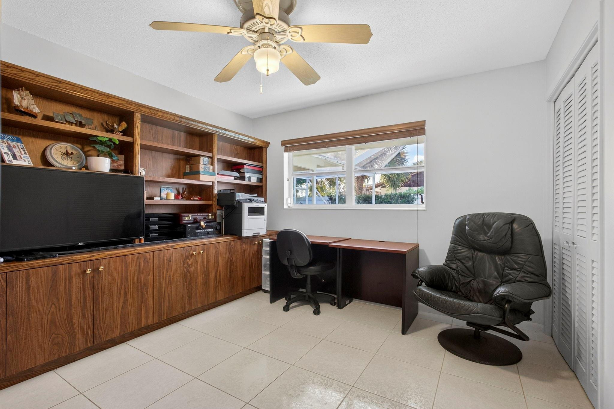 12753 Longford Road North Palm Beach, FL 33408 - Photo 47 of 68 a workspace with furniture