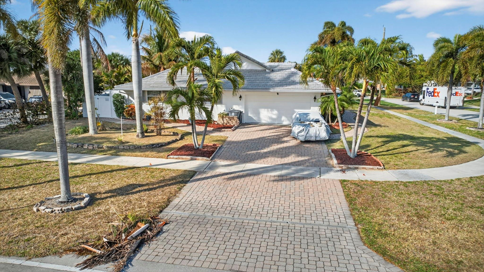12753 Longford Road North Palm Beach, FL 33408 - Photo 55 of 68 a view of a swimming pool with a patio