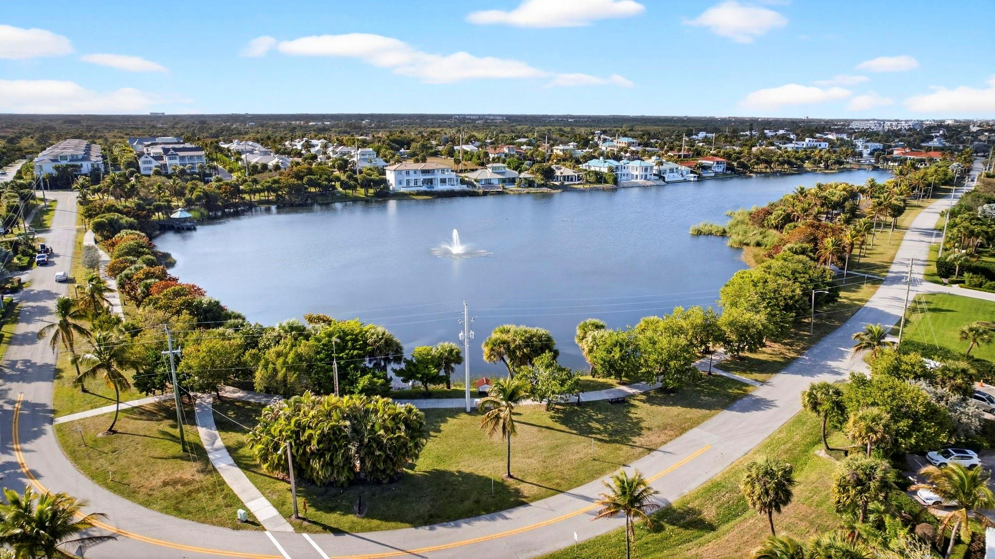 12753 Longford Road North Palm Beach, FL 33408 - Photo 62 of 68 an aerial view of a house with a lake view