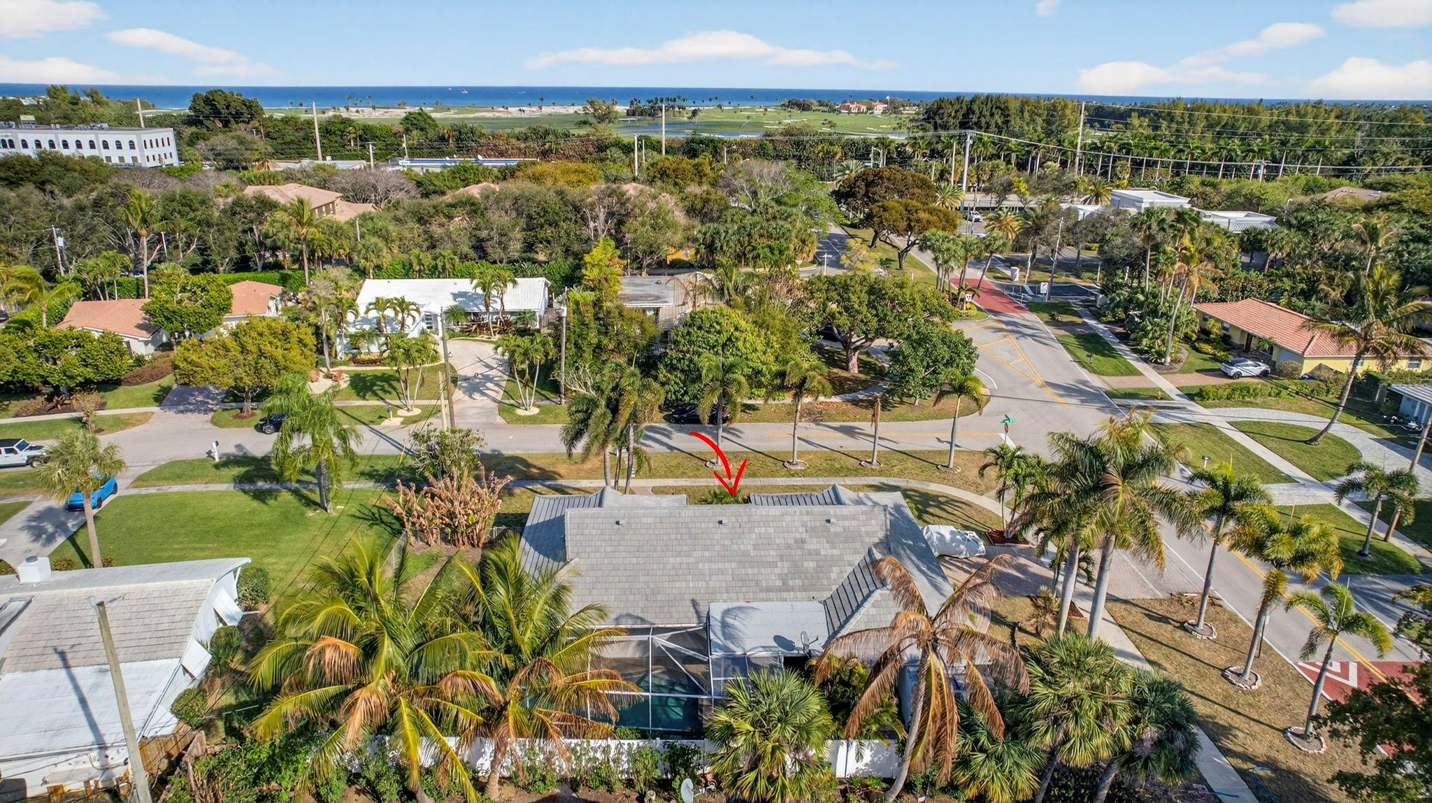 12753 Longford Road North Palm Beach, FL 33408 - Photo 64 of 68 an aerial view of residential houses with outdoor space and trees
