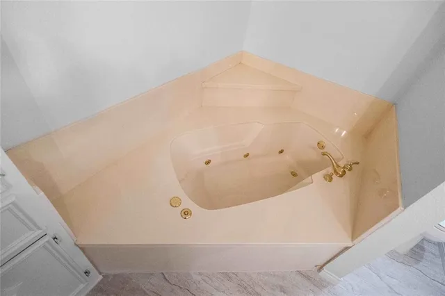 a bathroom with a bathtub