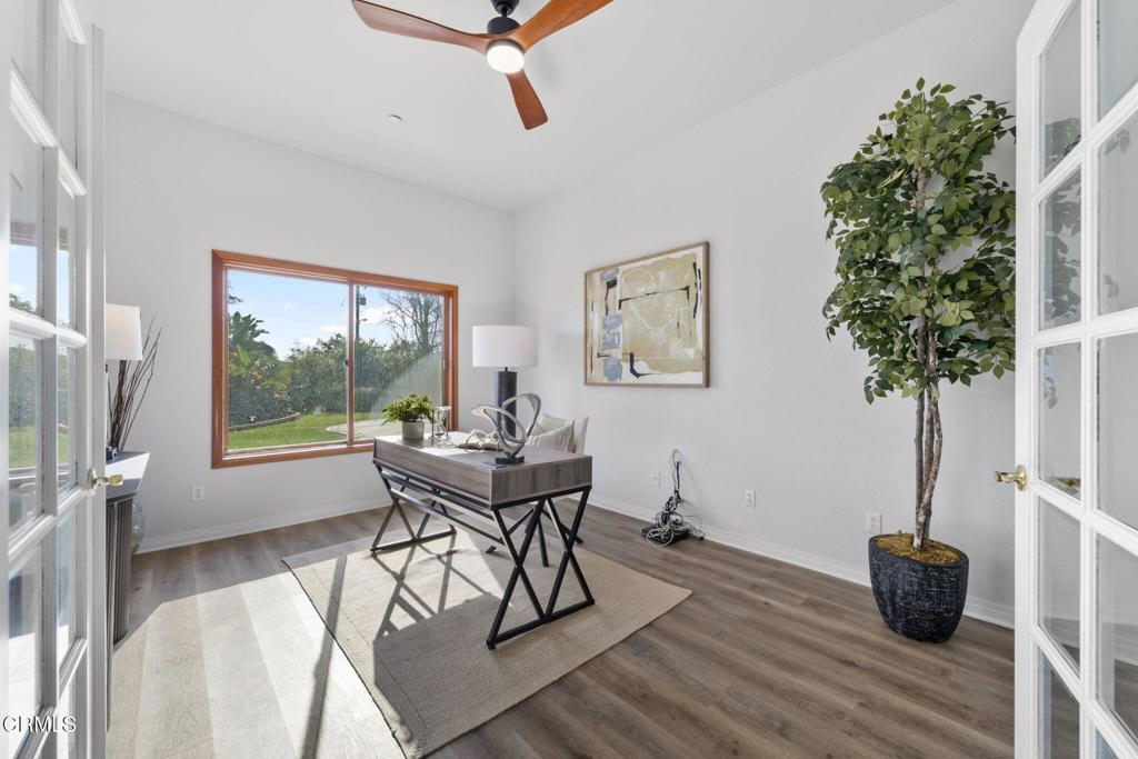 43650 Camaron Road Temecula, CA 92590 - Photo 20 of 52 a view of a livingroom with furniture and a potted plant