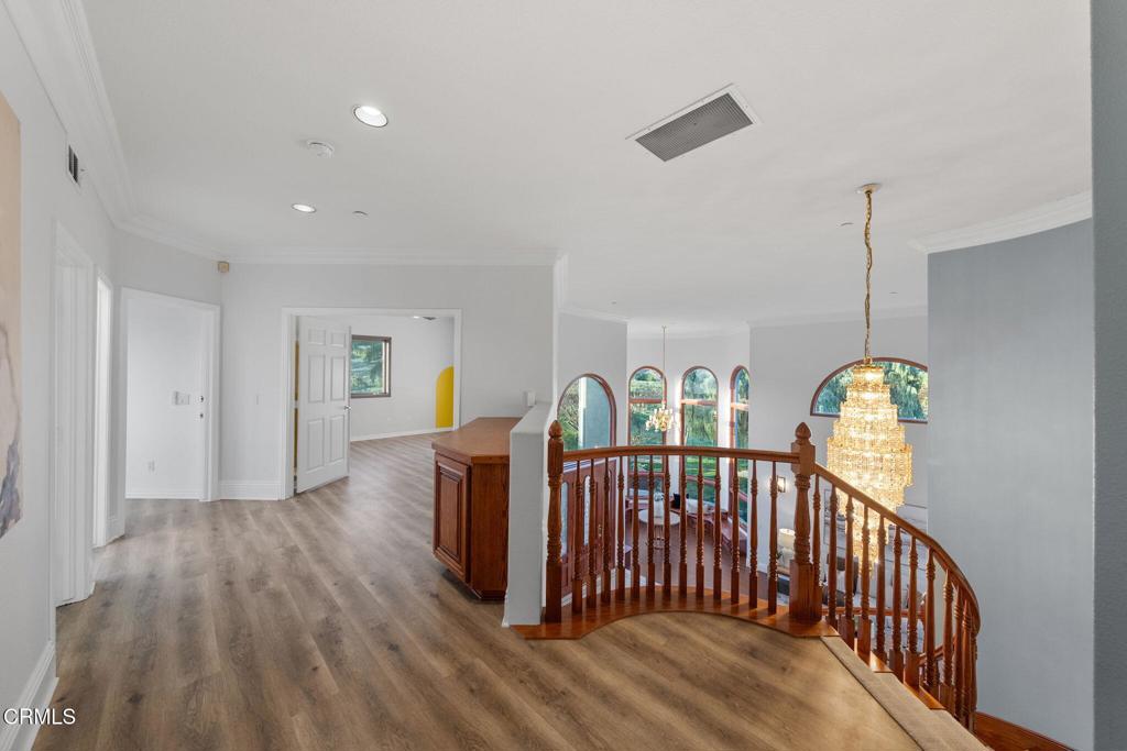 43650 Camaron Road Temecula, CA 92590 - Photo 25 of 52 a view of hall way with furniture and windows
