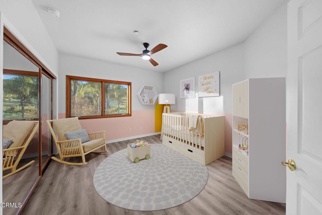 43650 Camaron Road Temecula, CA 92590 - Photo 27 of 52 a living room with furniture and wooden floor