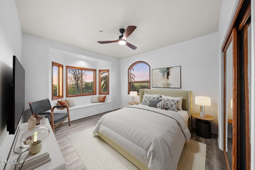 43650 Camaron Road Temecula, CA 92590 - Photo 29 of 52 a bedroom with a bed couch and a window