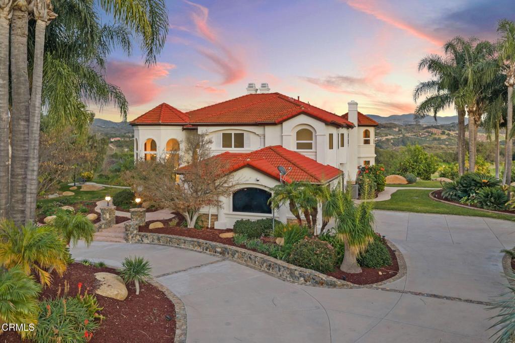 43650 Camaron Road Temecula, CA 92590 - Photo 4 of 52 a front view of a house with yard and outdoor seating