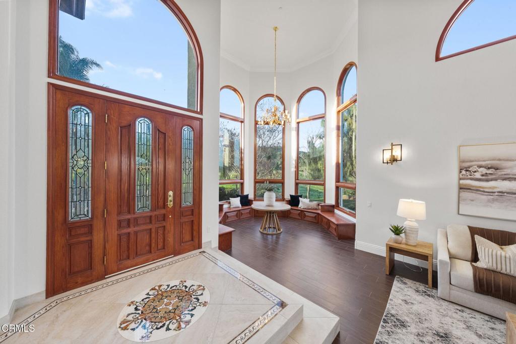 43650 Camaron Road Temecula, CA 92590 - Photo 7 of 52 a living room with furniture a rug and a large window