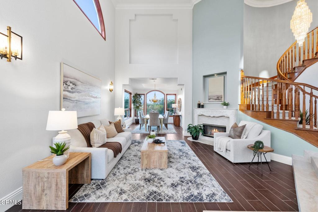 43650 Camaron Road Temecula, CA 92590 - Photo 10 of 52 a living room with furniture fireplace and a rug