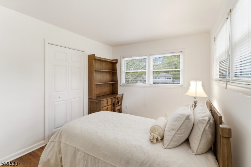 2286 Stocker Lane Scotch Plains, NJ 07076 - Photo 19 of 27 a bedroom with a bed and a window