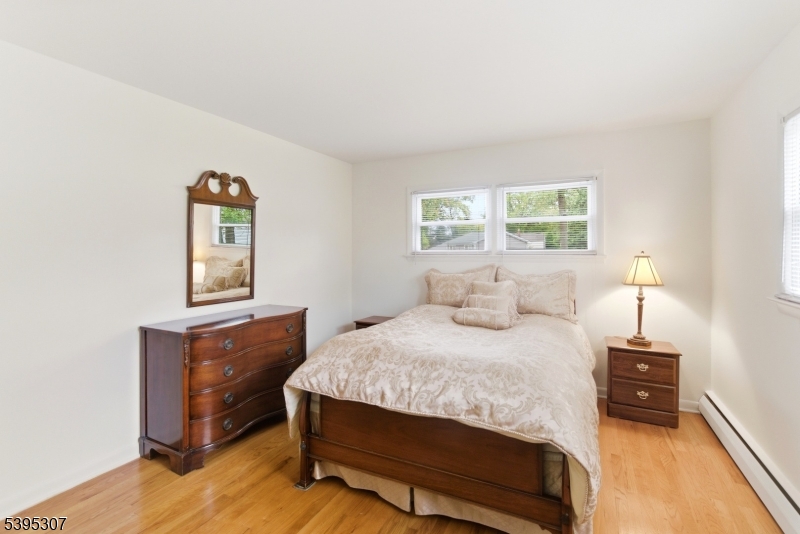 2286 Stocker Lane Scotch Plains, NJ 07076 - Photo 21 of 27 a bedroom with a bed and a window