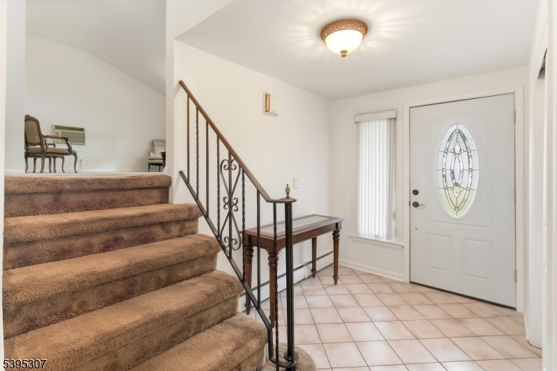 2286 Stocker Lane Scotch Plains, NJ 07076 - Photo 5 of 27 a view of entryway and hall with wooden floor