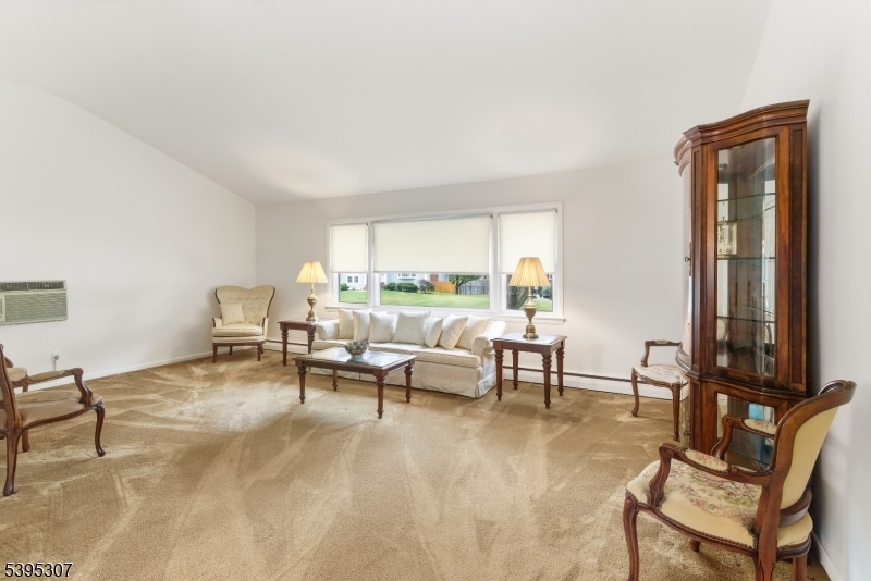 2286 Stocker Lane Scotch Plains, NJ 07076 - Photo 7 of 27 a living room with furniture and a window