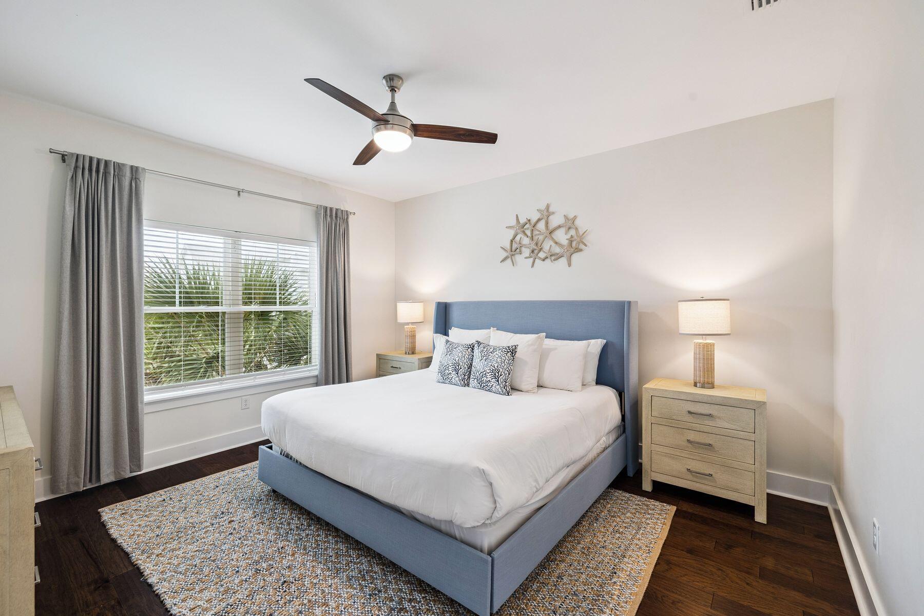 421 Gulfview Circle Santa Rosa Beach, FL 32459 - Photo 12 of 34 a bedroom with a large bed and a window