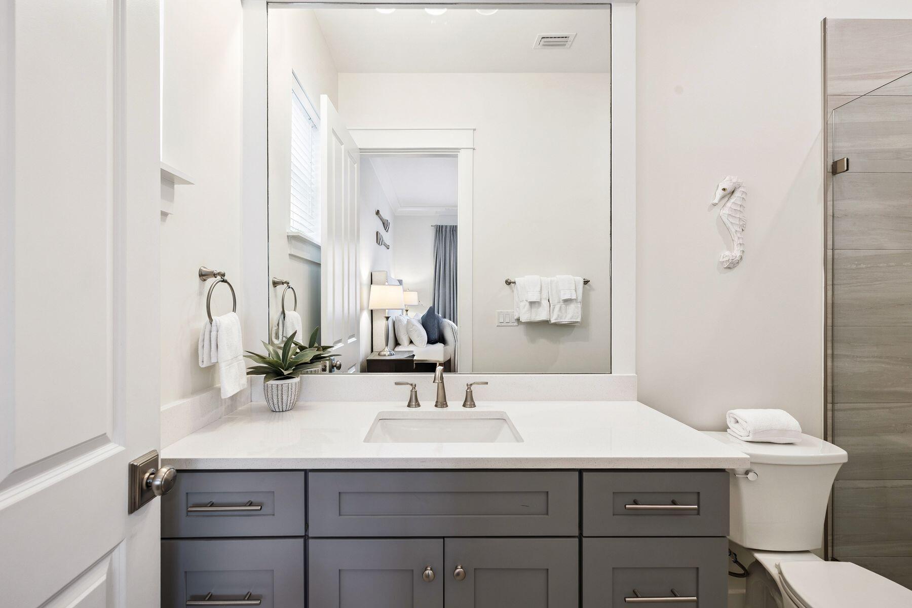 421 Gulfview Circle Santa Rosa Beach, FL 32459 - Photo 19 of 34 a bathroom with a sink and a toilet