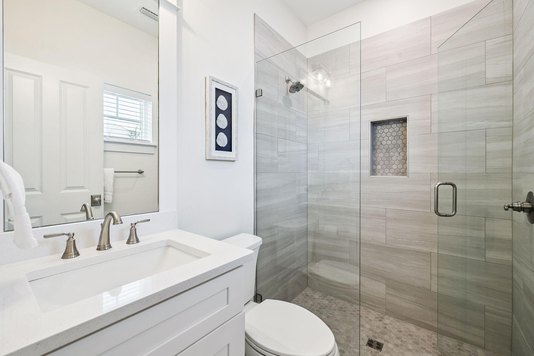 421 Gulfview Circle Santa Rosa Beach, FL 32459 - Photo 22 of 34 a bathroom with a sink toilet and shower
