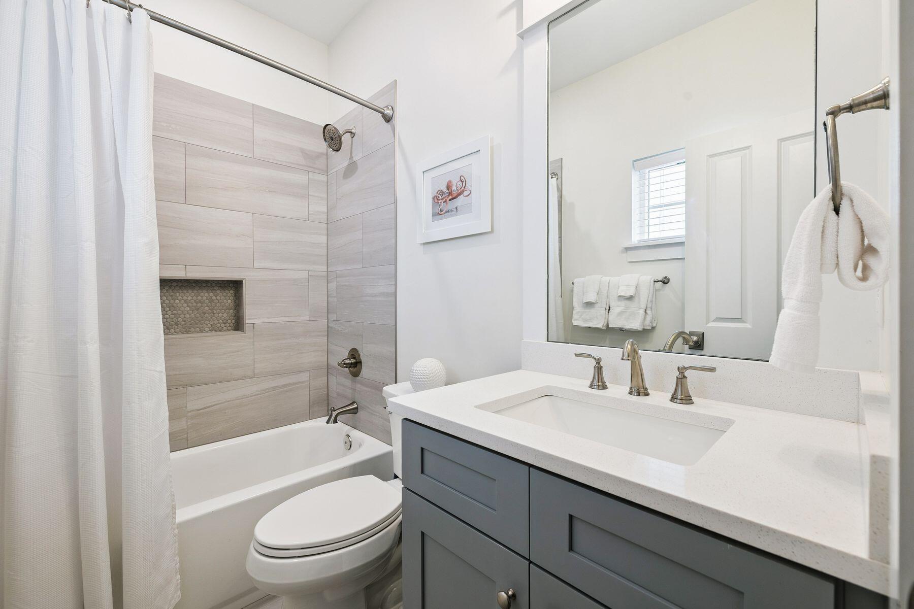 421 Gulfview Circle Santa Rosa Beach, FL 32459 - Photo 24 of 34 a bathroom with a sink a toilet and shower