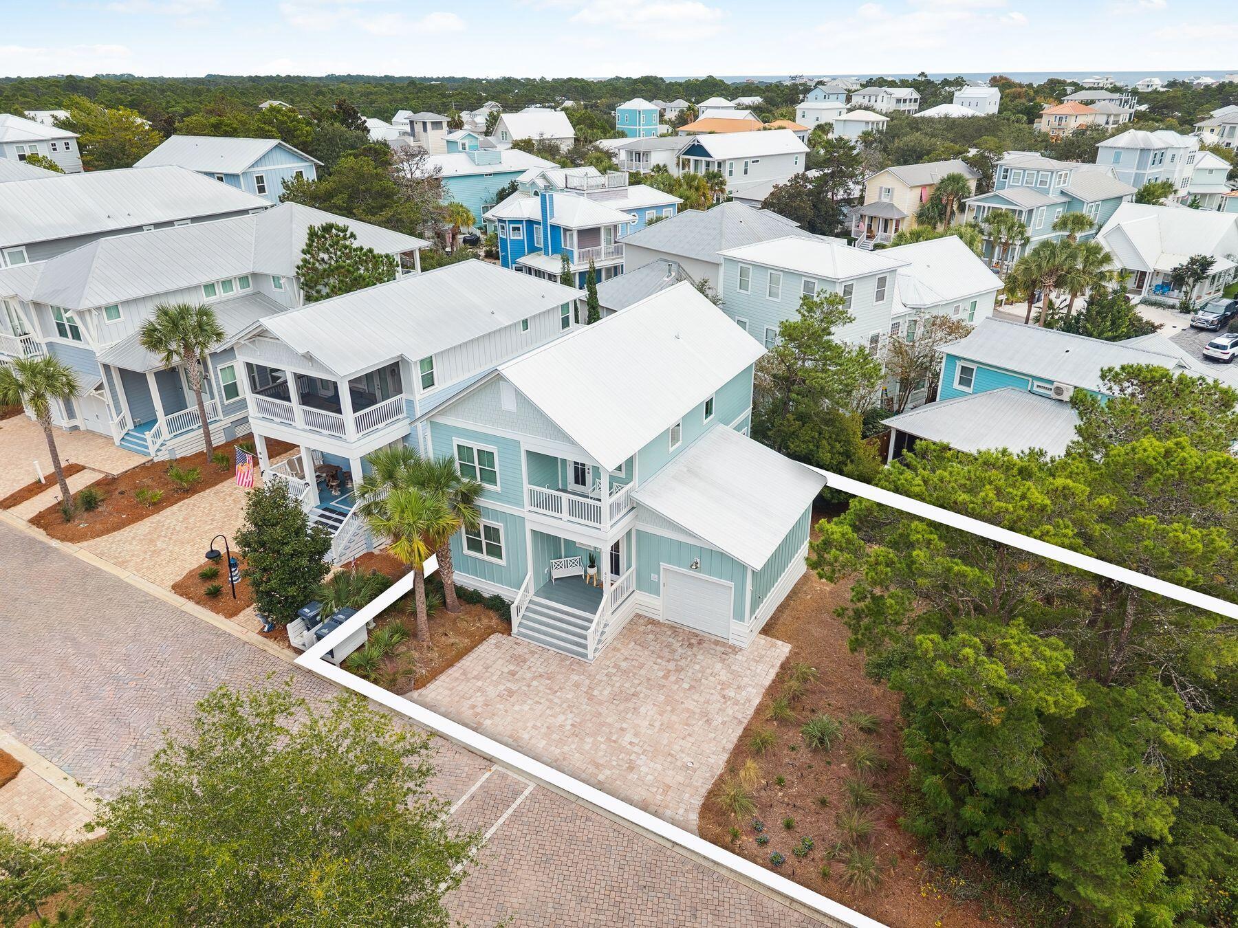 421 Gulfview Circle Santa Rosa Beach, FL 32459 - Photo 26 of 34 an aerial view of residential houses with outdoor space and street view