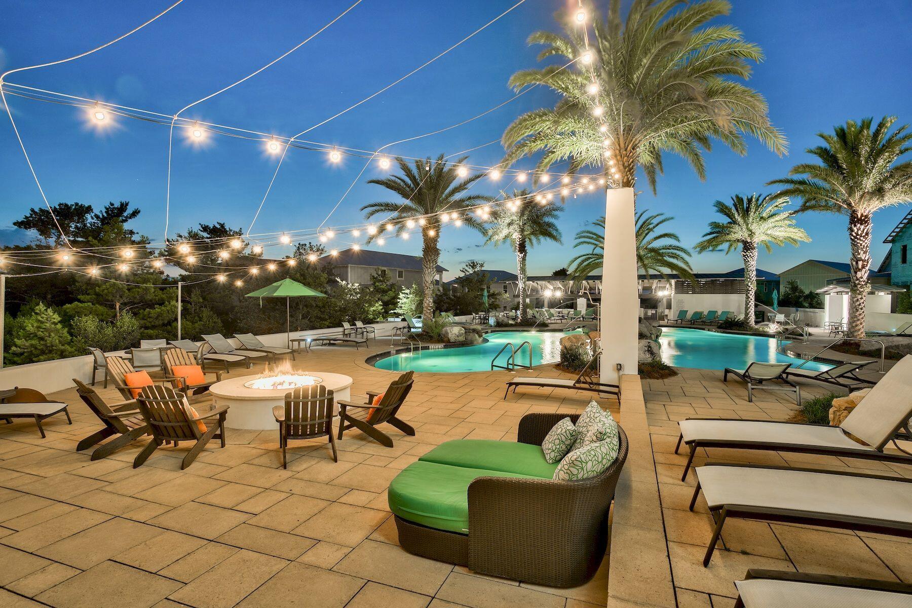 421 Gulfview Circle Santa Rosa Beach, FL 32459 - Photo 29 of 34 a view of a patio with swimming pool and sitting area